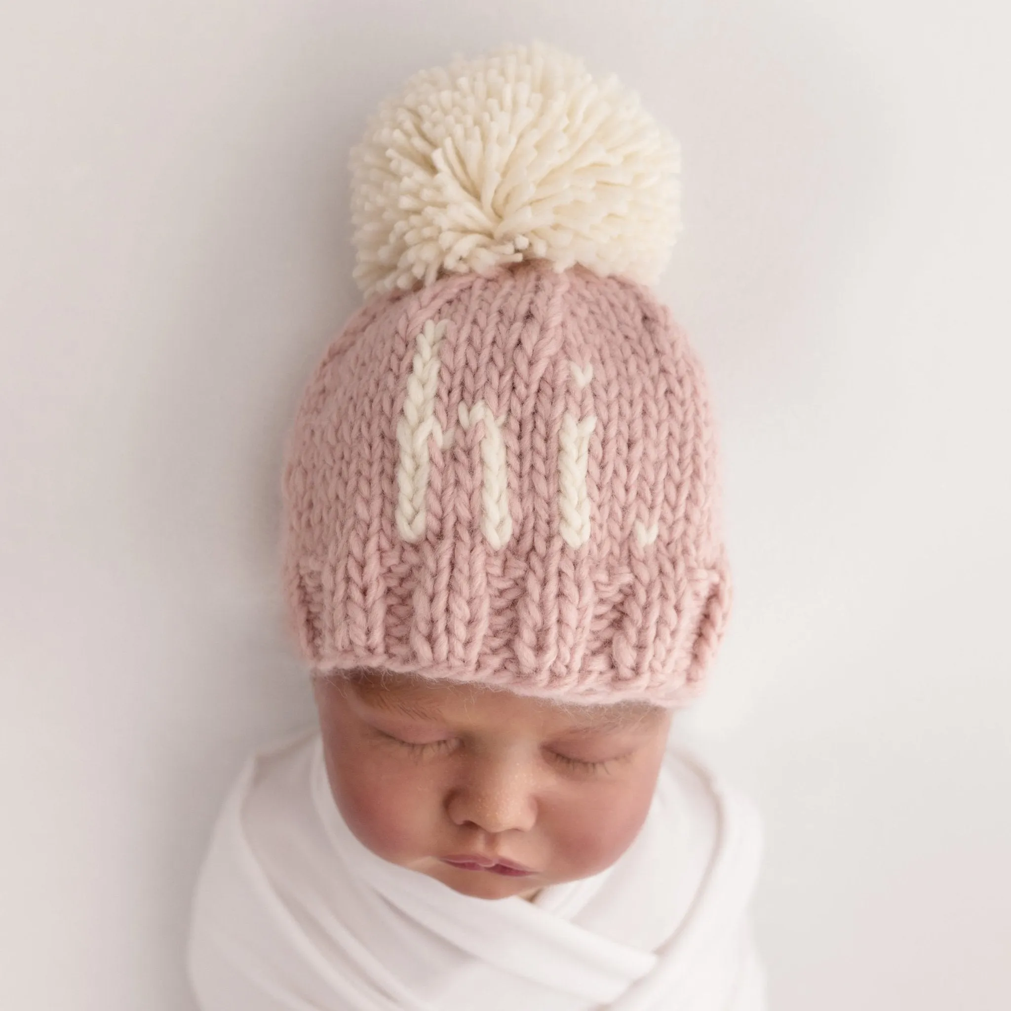 hi. Rosy Hand Knit Beanie Hat