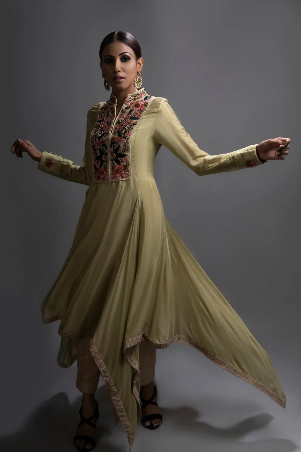 Riyadh Drape Tunic Paired With Jute Pants.